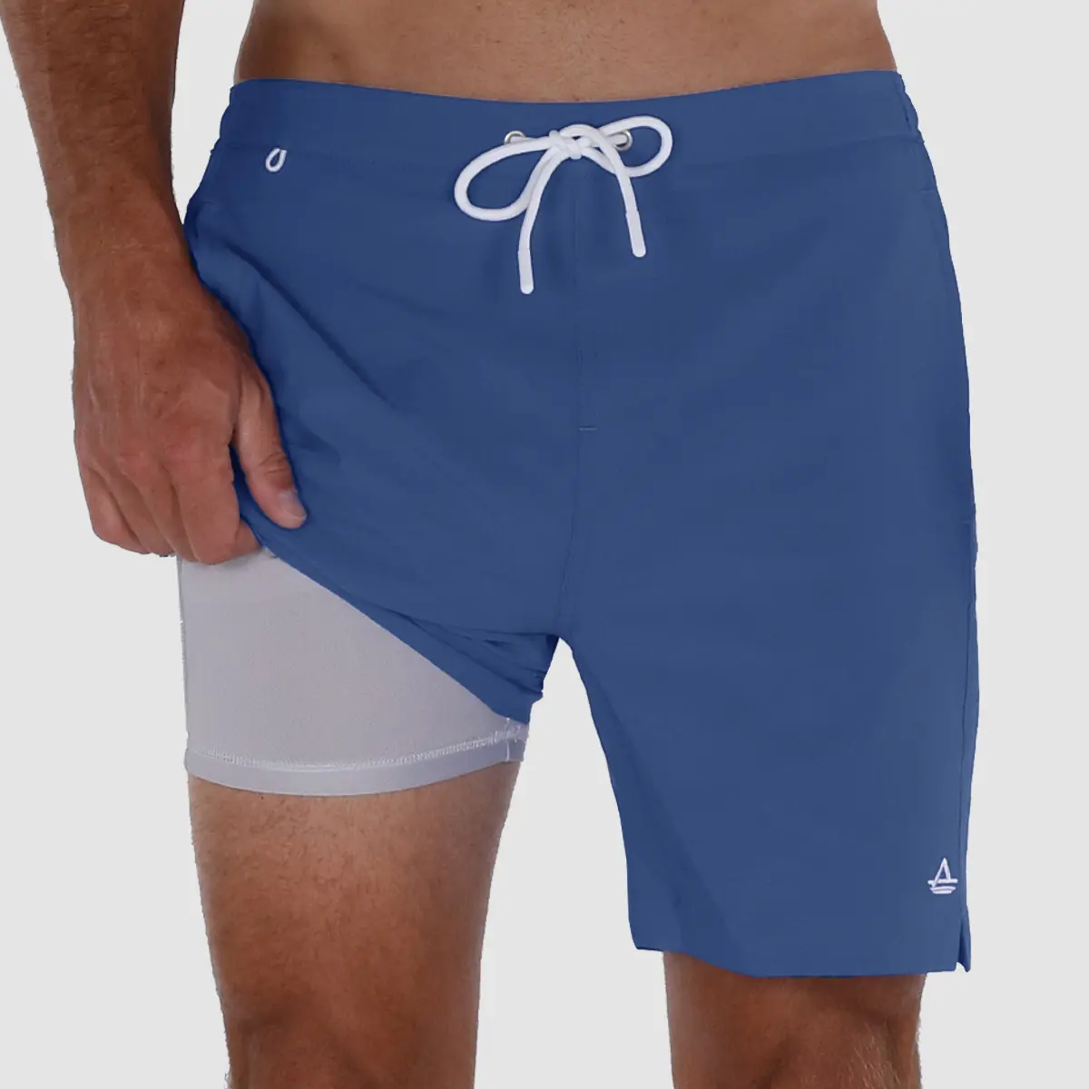 https://www.avalonsupply.com/wp-content/uploads/2023/06/swim-trunks-with-compression-liner-stone-blue.jpg